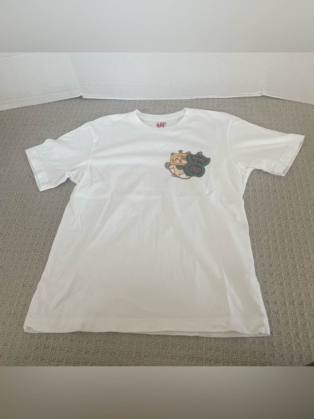 Women’s Uniqlo white short sleeve top